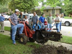 a trenching party held to install a new sprinkler system in Dallas